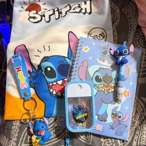 Stitch 5 piece set.  Includes bag, notebook, pen, spray bottle & keychain.